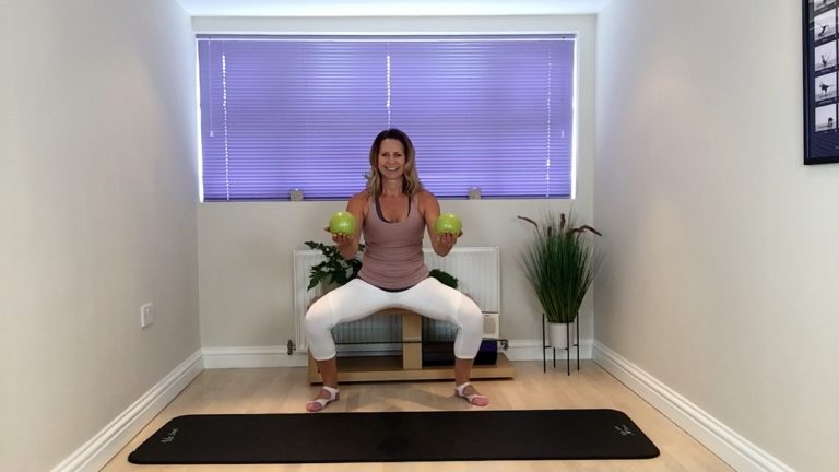 Weighted balls pilates exercise