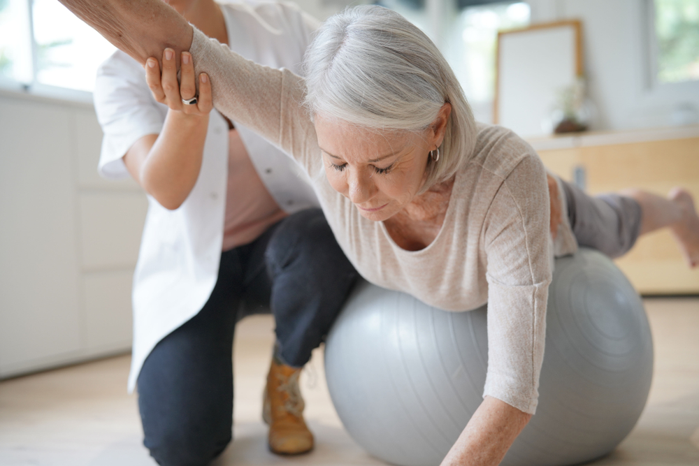 Elderly lady doing Physiotherapy and Pilates